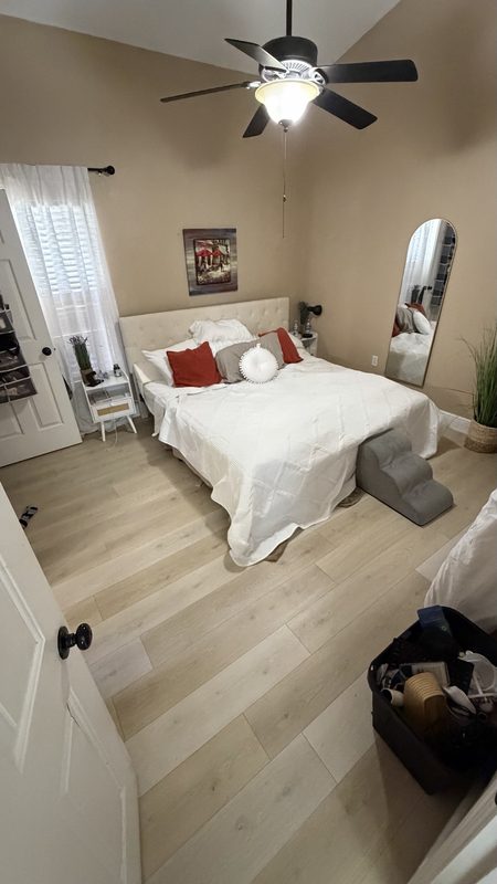 Davenport bedroom with new light oak LVP