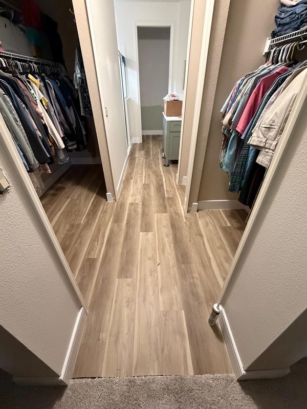Walk-in closet with new LVP running through